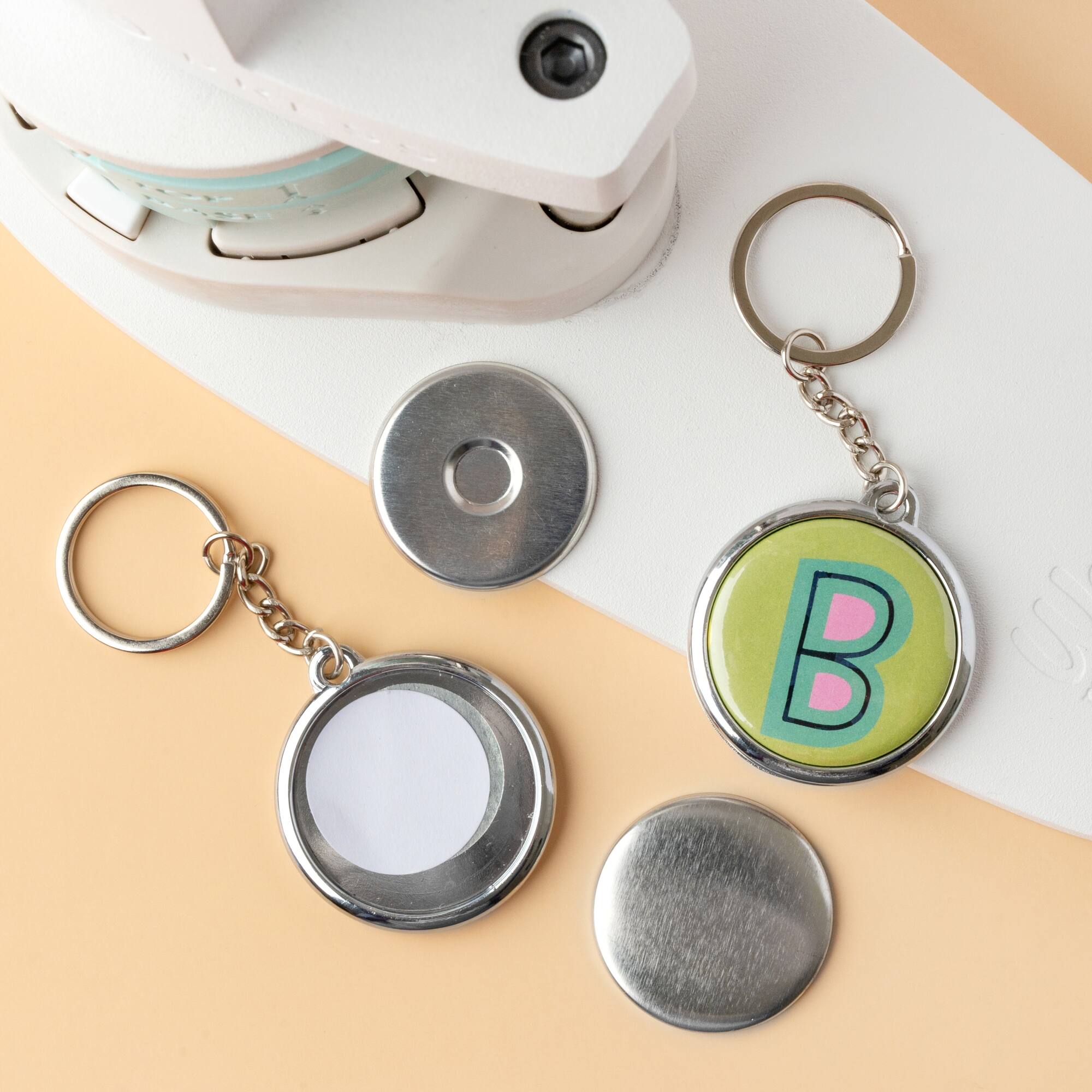 We R Memory Keepers® Button Press™ Keychain Kit, 10ct.